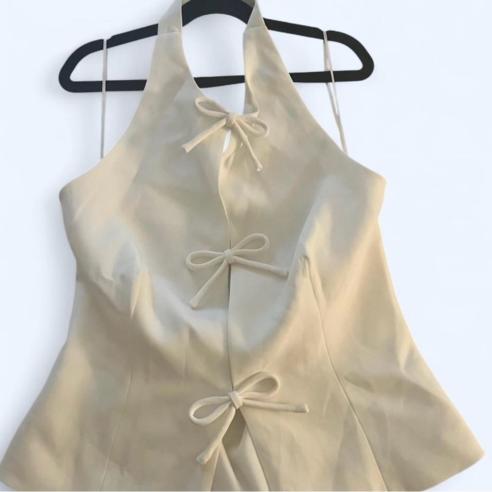 Elegant Cream Sleeveless Top with Bow Accents - Picture 3 of 7